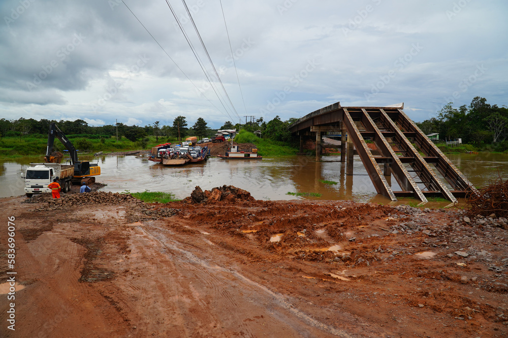 Collapsed bridge in Brazil of highway BR 319 over the Rio Curuca, A bridge pier was not anchored deep enough in the ground during construction and snapped off years later. Near Autazes, Amazonas. Collapsed bridge in Brazil of highway BR 319 over the Rio Curuca, A bridge pier was not anchored deep enough in the ground during construction and snapped off years later. Near Autazes, Amazonas.