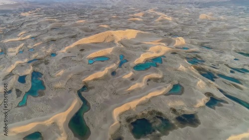 Aerial view of water formations after spring rains in the Sahara Desert, Algeria.