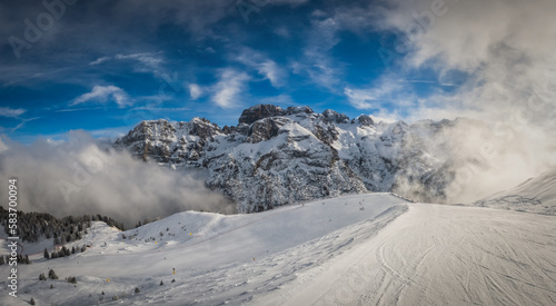 A beautiful view of Brenta Dolomites with fantastic clouds and Alps Madonna di Campiglio, Pinzolo, Italy. January 2023