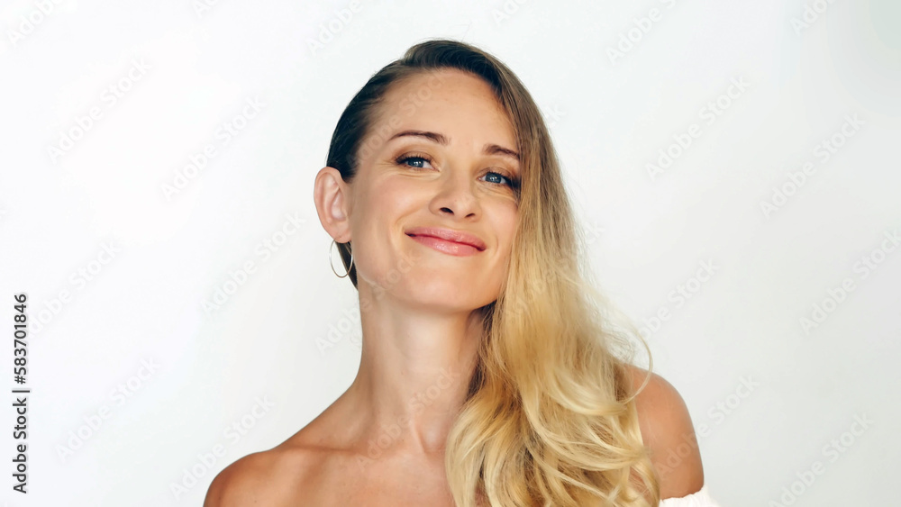 Beautiful woman touching skin on nose front camera during shooting video blog Beautiful woman touching skin on nose front camera during shooting video blog