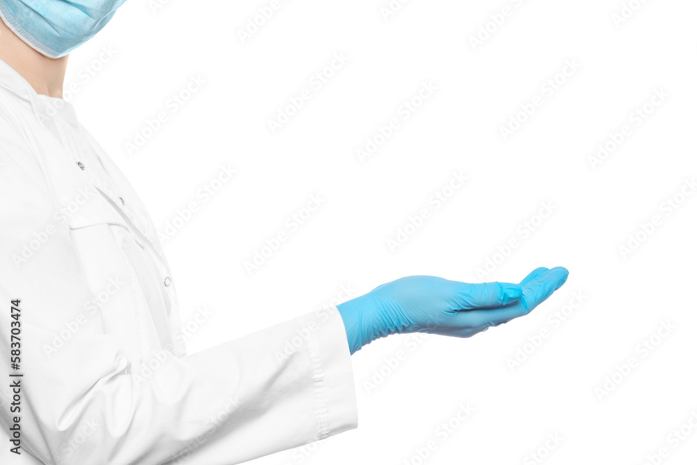 A doctor in a medical gown, mask and gloves holds hand in front of. There is a place for your advertisement, mockup