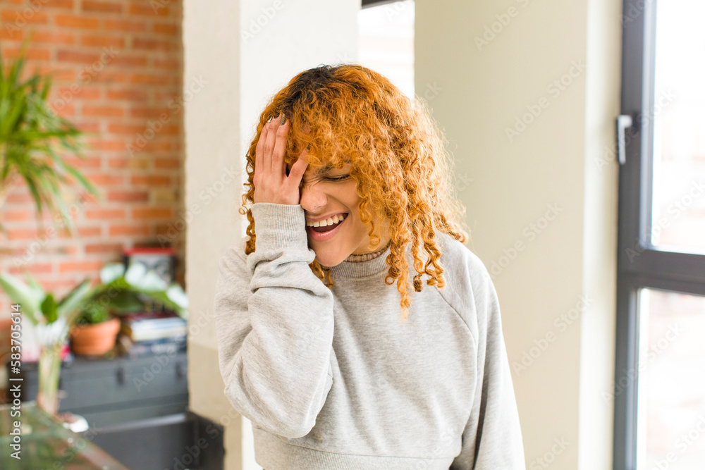 young red hair latin pretty womann at new cool home