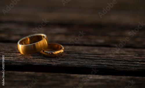 Wedding rings. wedding rings on wooden background