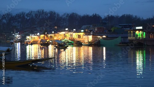 The shikara is a type of wooden boat found on Dal Lake and other water bodies of Srinagar in Jammu and Kashmir, India. photo