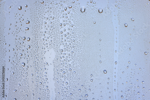 drops glass blue background abstract, transparent cold background water splashes