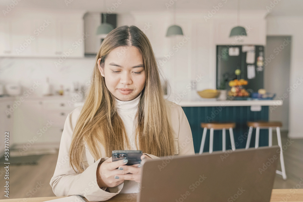 Young adult Asian woman working from home, distance learning, online teaching, video conference concept Young adult Asian woman working from home, distance learning, online teaching, video conference concept