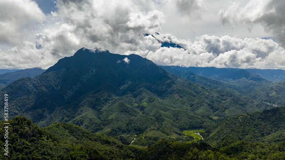 Aerial view of Mountain peaks covered with forest. Mount Kinabalu. Borneo,Sabah, Malaysia.