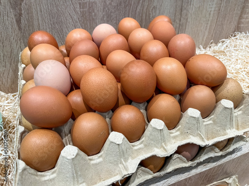 Locally-sourced Farmer Brown's fresh chicken eggs available at the grocery store photo