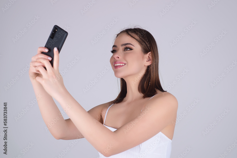 Business woman with mobile phone or smartphone. Business woman with mobile phone or smartphone.