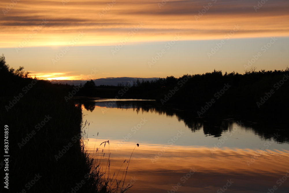 Sunset Glow Over The Lake