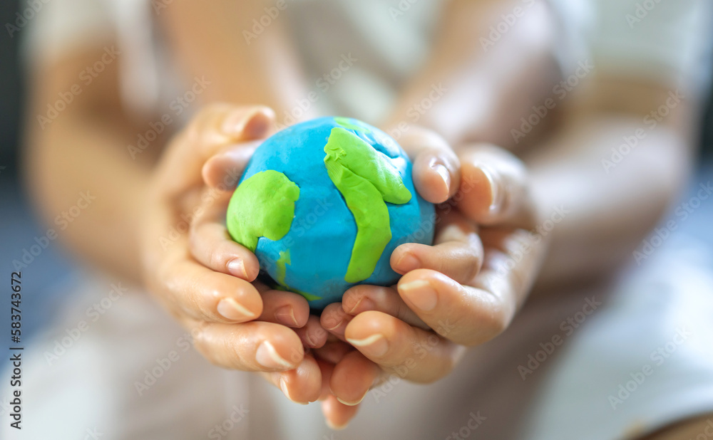 Hand of mother and kid child holding planting care saving clean energy earth globe world environment green eco friendly.campaign save the earth and earth Day 22 April Hand of mother and kid child holding planting care saving clean energy earth globe world environment green eco friendly.campaign save the earth and earth Day 22 April