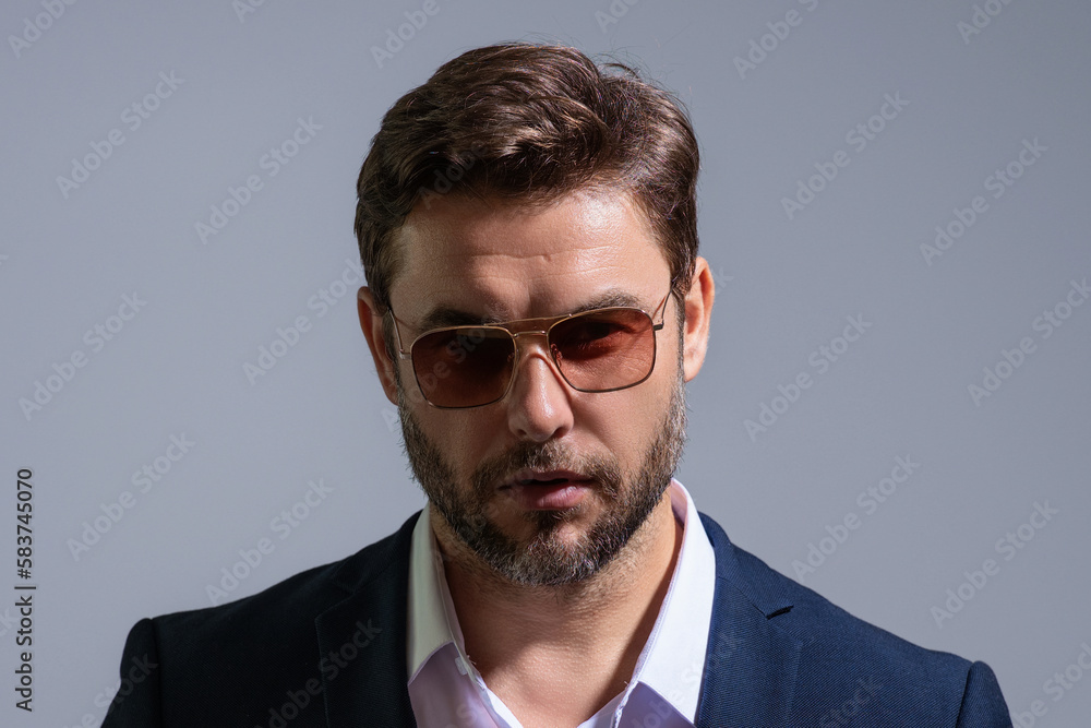 Handsome middle aged man in suit isolated on studio background. Close up handsome business man in business suit. Banner for header, copy space. Poster for web design. Personal finance. Handsome middle aged man in suit isolated on studio background. Close up handsome business man in business suit. Banner for header, copy space. Poster for web design. Personal finance.