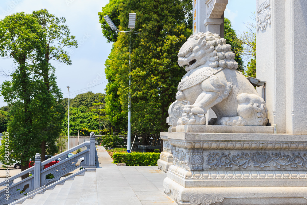 Chinese Lion guardian statue at Gate of Zhuhai Putuo Temple.