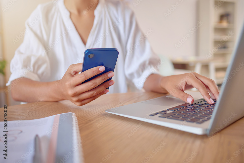 Phone, laptop and search with hands of woman in office for social media, networking and connection. Internet, technology and planning with female for contact, communication and browsing online Phone, laptop and search with hands of woman in office for social media, networking and connection. Internet, technology and planning with female for contact, communication and browsing online