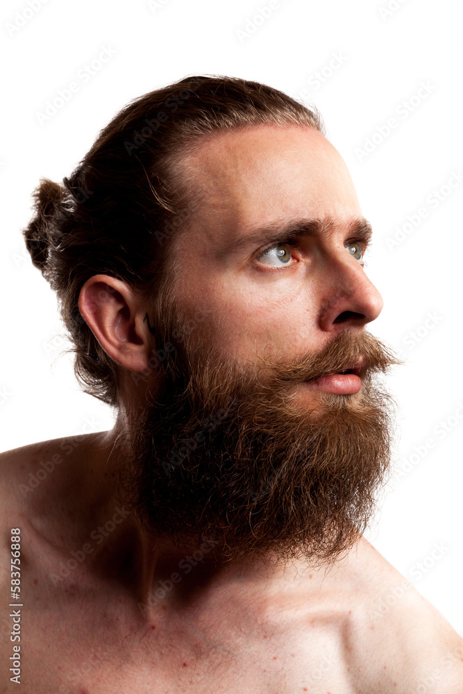 Obraz premium Cool hipster with long beard isolated over white background in studio photo