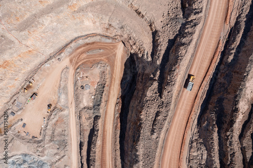 Aerial view of mining trucks at a mine site in Australia photo