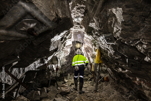 Miners undergound at a mine site in Australia photo
