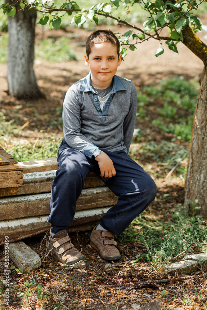 Little boy relax outdoors. Today is a day made for fun. Little boy relax outdoors. Today is a day made for fun.