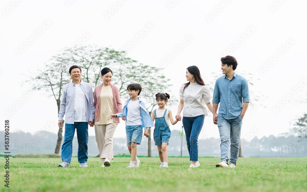 Asian family photo walking together in the park Asian family photo walking together in the park