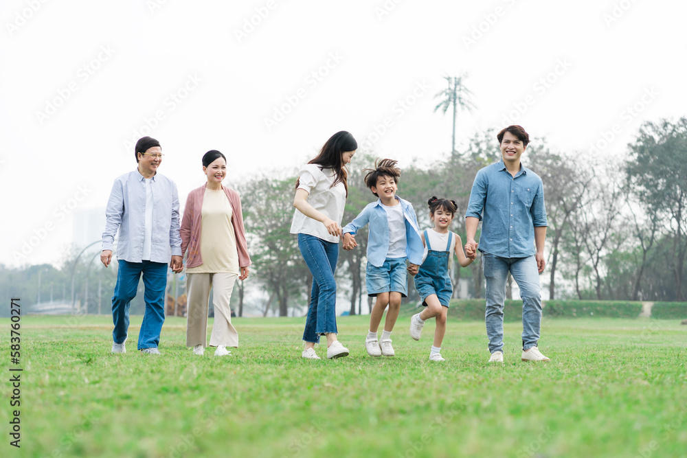 Asian family photo walking together in the park Asian family photo walking together in the park