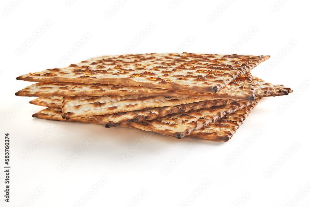 Pesach celebration concept - Jewish holiday Pesach. Stacked matzah isolated on white background
