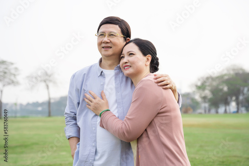Elderly Asian couple in the park