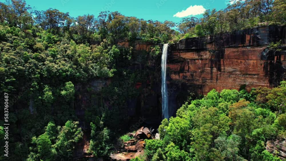 Fitzroy Falls, Australia, Aerial Drone Flys over tree canopy towards Falls Fitzroy Falls, Australia, Aerial Drone Flys over tree canopy towards Falls