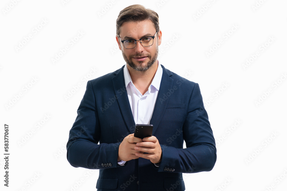 Portrait of a business man in suit using mobile phone. Caucasian man using smart phone cellphone for calls, social media, mobile app. Online chatting. Guy talking on the phone. Portrait of a business man in suit using mobile phone. Caucasian man using smart phone cellphone for calls, social media, mobile app. Online chatting. Guy talking on the phone.