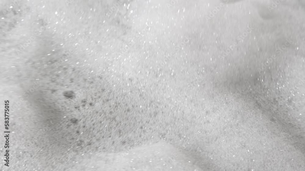 Foam bubble from soap or shampoo top view. Soap foam texture surface for white abstract background. Detergent foam. Copy space, banner. For laundry, cleaning service. Bathroom, clean, wash concept Foam bubble from soap or shampoo top view. Soap foam texture surface for white abstract background. Detergent foam. Copy space, banner. For laundry, cleaning service. Bathroom, clean, wash concept