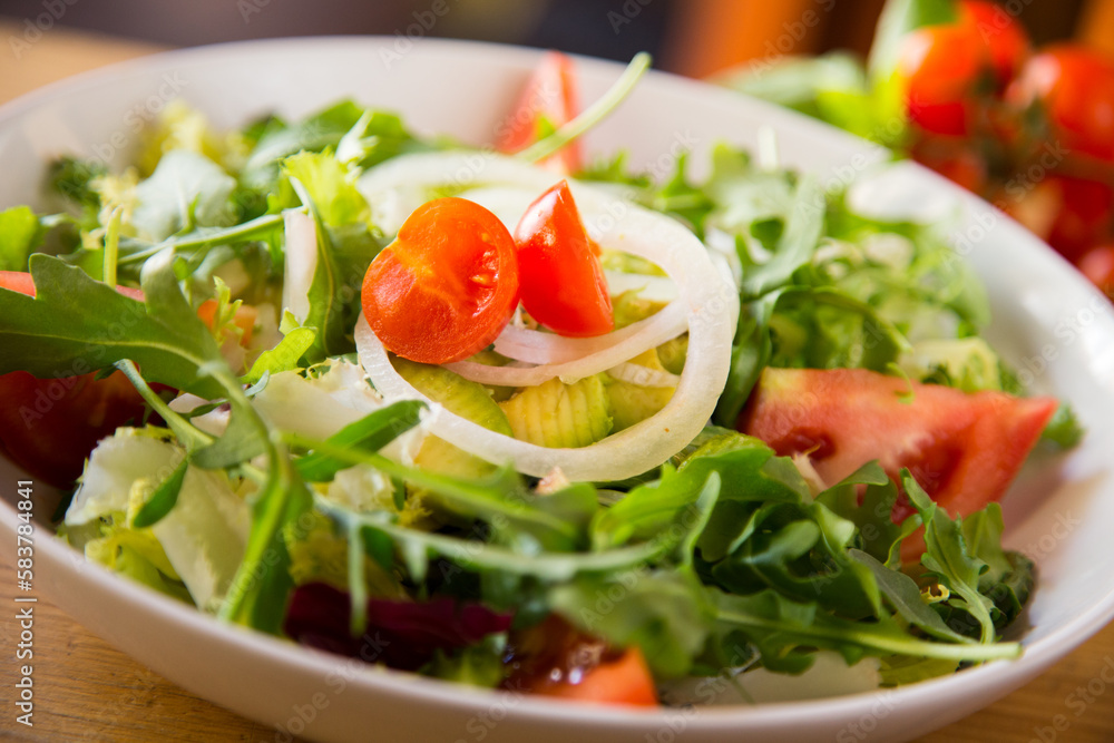 Delicious avocado salad with fresh tomatoes. Delicious avocado salad with fresh tomatoes.