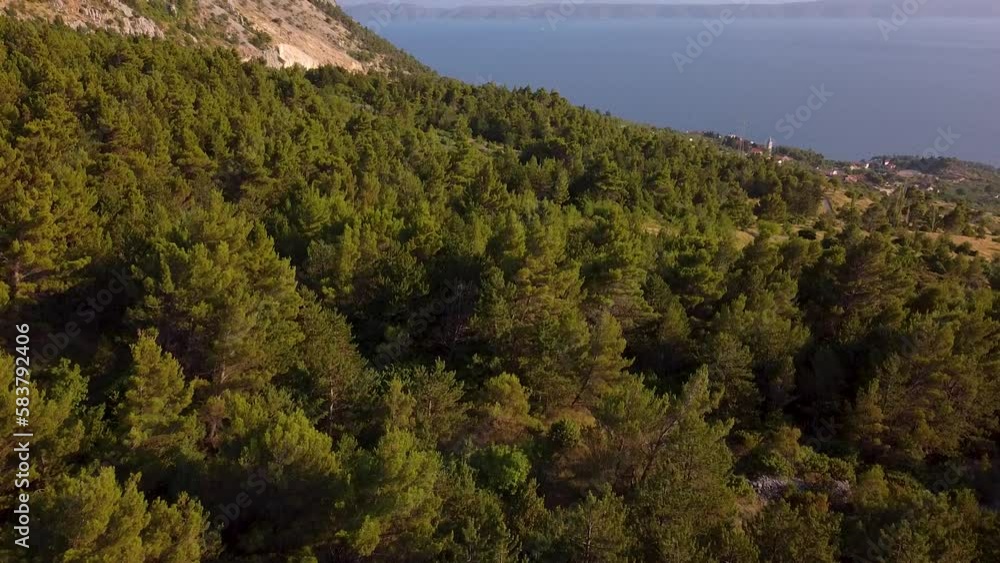 A Breathtaking Aerial Reveal Of A Road Winding Through The Mountainside With The Stunning Mediterranean Sea In The Background In The Beautiful Country Of Croatia A Breathtaking Aerial Reveal Of A Road Winding Through The Mountainside With The Stunning Mediterranean Sea In The Background In The Beautiful Country Of Croatia