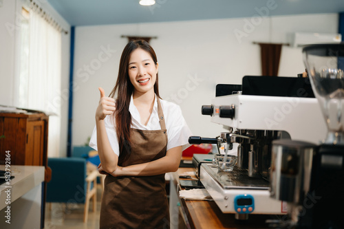 Startup successful small business owner sme woman stand with tablet in cafe. woman barista cafe owner. .