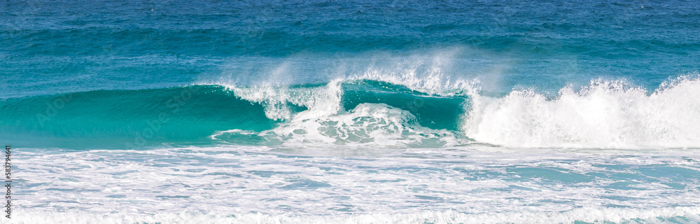 wave breaking on the beach