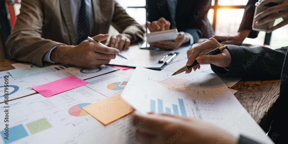 group of business people brainstorm discussing current finance and economy on company investment paperwork at meeting room group of business people brainstorm discussing current finance and economy on company investment paperwork at meeting room