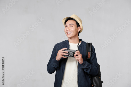 portrait of happy tourist photographer man on white background