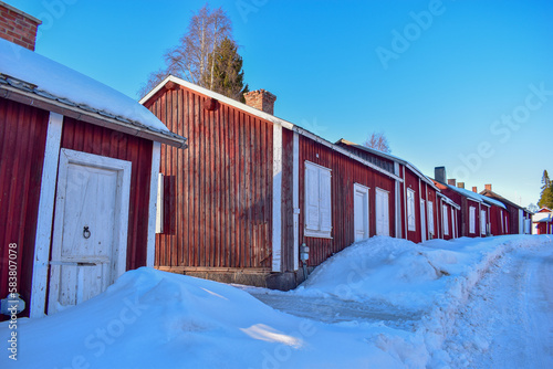 Rows with red huts in Gammelstad church town located near the Swedish town Lulea. © Adam