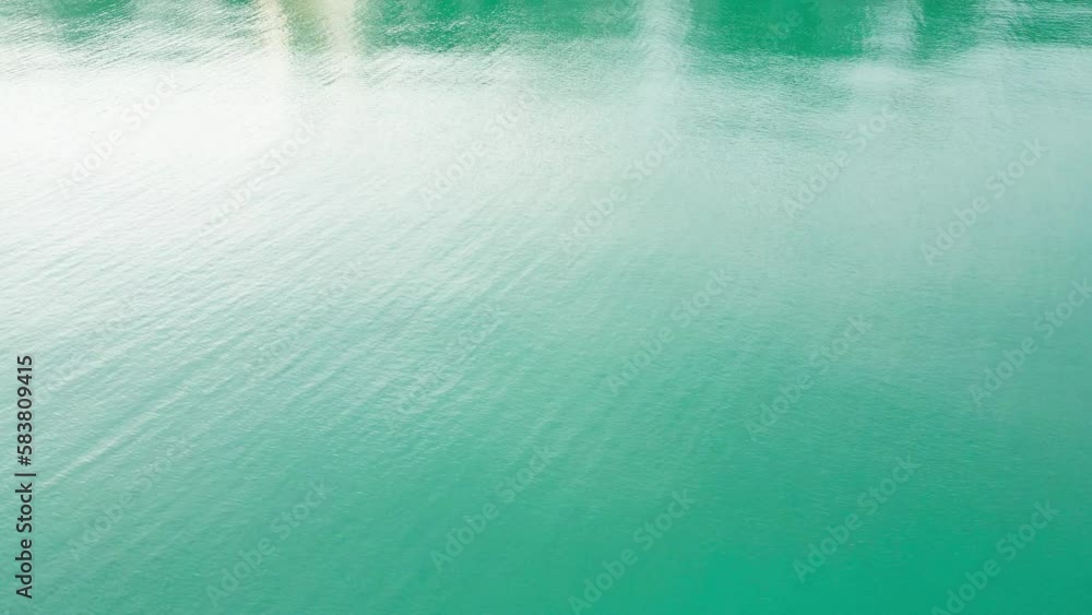 Top view of beautiful tropical beach seamless loop footage. Amazing Sandy coastline with white turquoise sea waves. Drone moving forward over sea Top view of beautiful tropical beach seamless loop footage. Amazing Sandy coastline with white turquoise sea waves. Drone moving forward over sea