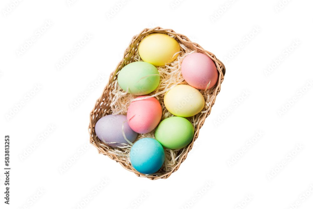 Basket of colorful Easter eggs isolated on white background. Easter basket filled with colored eggs top view holiday concept Basket of colorful Easter eggs isolated on white background. Easter basket filled with colored eggs top view holiday concept