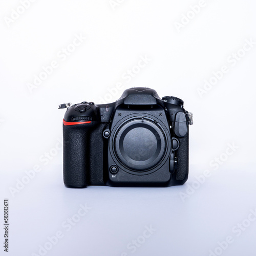 black SLR camera on a white background