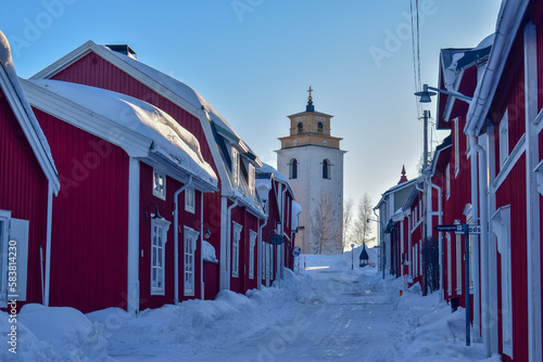 Rows with red huts in Gammelstad church town located near the Swedish town Lulea. photo