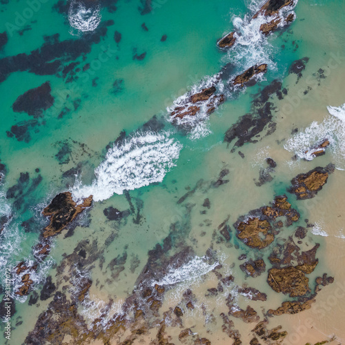 Fototapeta Naklejka Na Ścianę i Meble -  Wave patterns on a beach from above, Narooma, NSW, January 2023