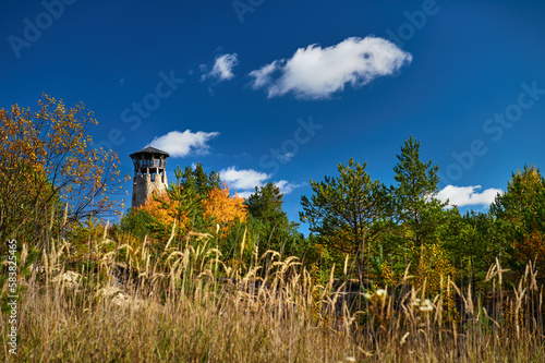 A stone lookout tower on a hill above a quarry in Józefów in Roztocze photo