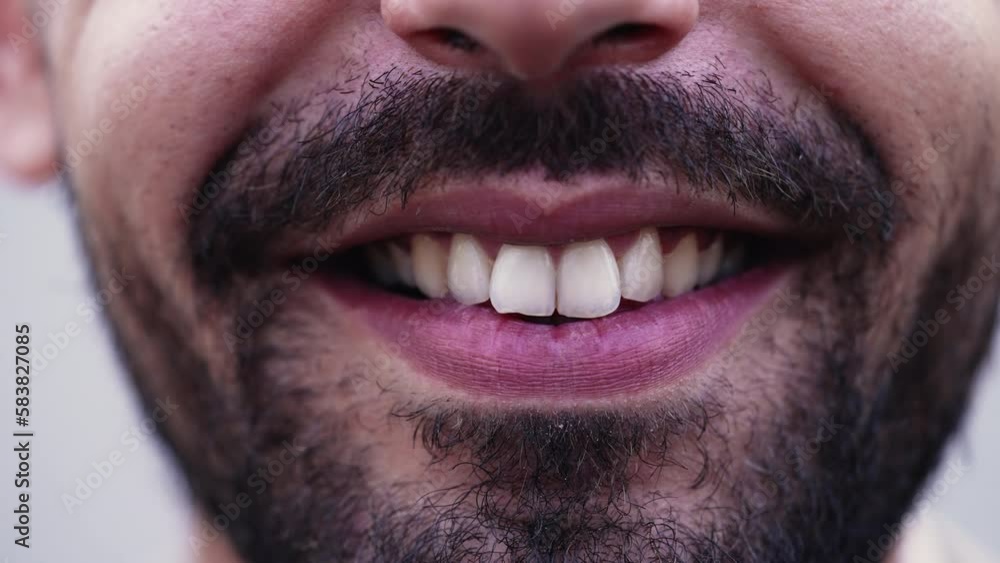 Macro closeup of a Middle Eastern man smile. Mouth and teeth close up detail of an Arab male person smiling. Bearded guy with Happy Expression Macro closeup of a Middle Eastern man smile. Mouth and teeth close up detail of an Arab male person smiling. Bearded guy with Happy Expression
