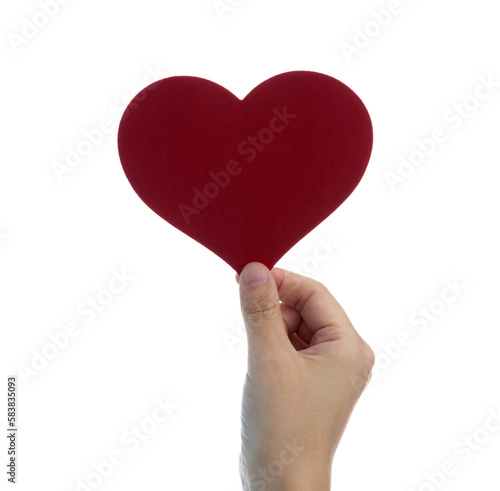 Woman hand holding red heart