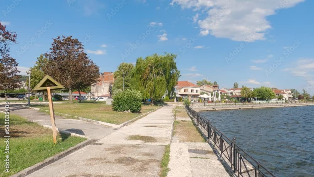 Pan shot of Tranquil scene, Katsari park promenade on the lakeside in Ioannina, Greece Pan shot of Tranquil scene, Katsari park promenade on the lakeside in Ioannina, Greece