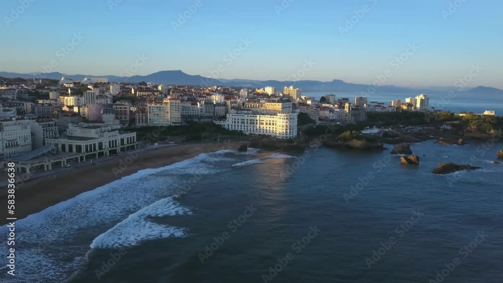 Historical buildings along Grande Plage beach at Biarritz. Aerial forward at sunset and sky for copy space Historical buildings along Grande Plage beach at Biarritz. Aerial forward at sunset and sky for copy space