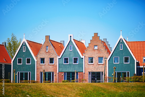 Colorful houses in marine park in Volendam