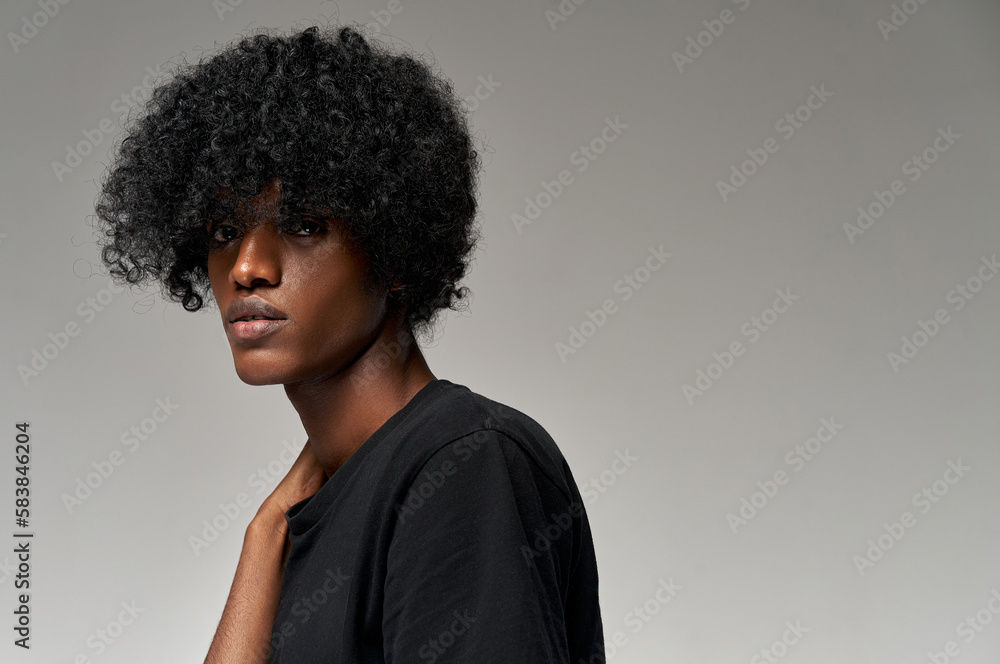Portrait of handsome african man isolated on gray background Portrait of handsome african man isolated on gray background