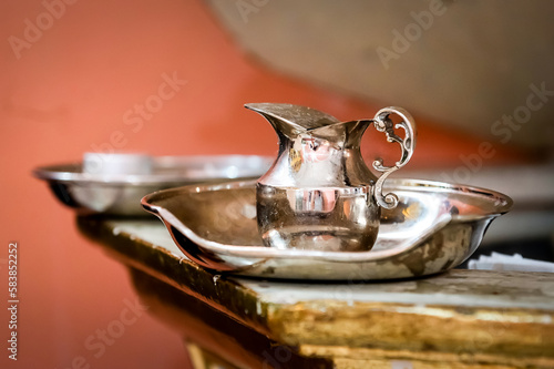 Slika na platnu ceremony baptism silver water container