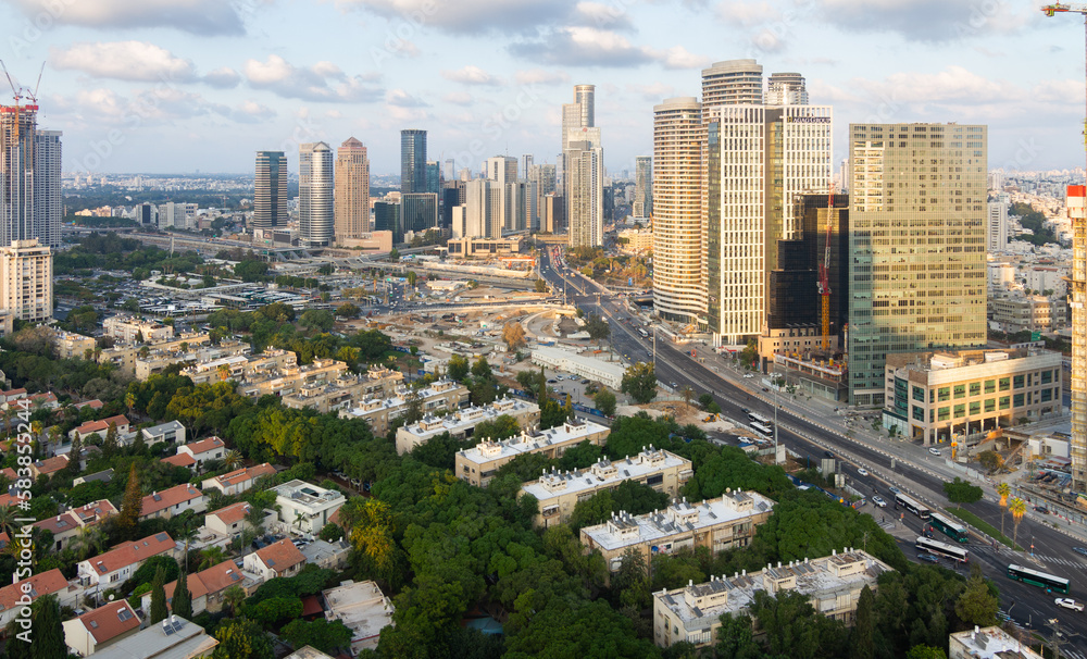 Naklejka premium Tel Aviv-Yafo, Israel - September 23, 2020: Tel Aviv and Ramat Gan aerial view. Green dormitory quaters and modern skyscrapers
